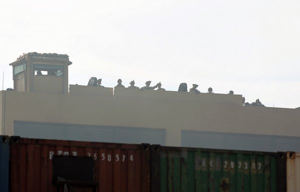US forces stand guard on the roof of the US Embassy in Baghdad on January 1st. [Ahmad al-Rubaye/AFP]