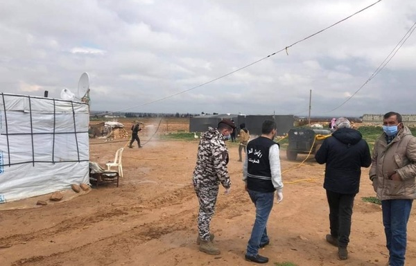 A Lebanese GDGS team took part in disinfecting Syrian refugee camps in the northern Bekaa, including the al-Qaa and Hermel camps, in co-operation with local municipalities. [Photo courtesy of Lebanese General Directorate of General Security]