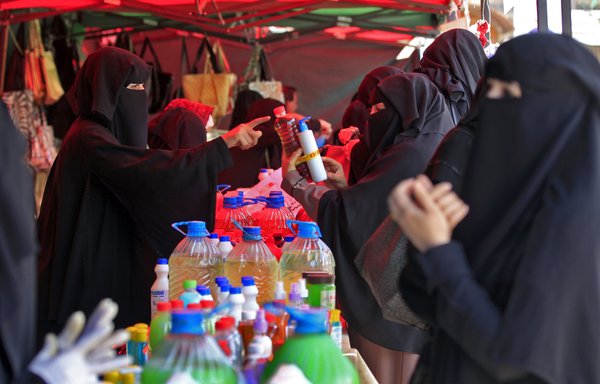 Women shop for hand and surface disinfectants at a market in Houthi-held Sanaa on April 2nd amid concerns about the novel coronavirus pandemic. [Mohammed Huwais/AFP]