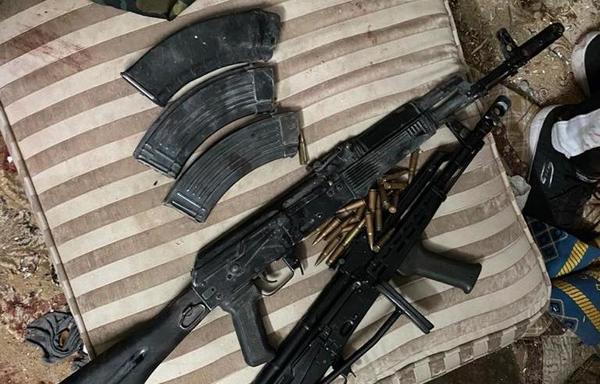 Egyptian security forces display weapons found in the possession of a terror cell in al-Amiriya. [Photo courtesy of Egypt's Interior Ministry]