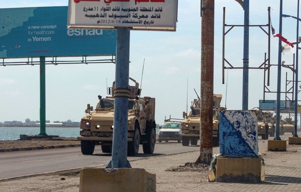 A convoy of Saudi military vehicles patrols in the southern Yemeni city of Aden on April 26th after Yemen's separatist Southern Transitional Council declared self-rule in the south of the country. [Saleh al-Obeidi/AFP]
