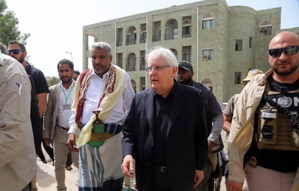 UN Special Envoy for Yemen Martin Griffiths (centre) arrives for a meeting with Houthi officials in the embattled Yemeni Red Sea port city of al-Hodeidah on January 29th, 2019. [Abdo Hyder/AFP]