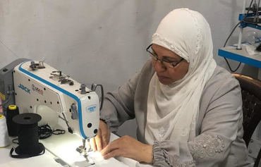 Lebanese, Syrian women sew face masks amid pandemic