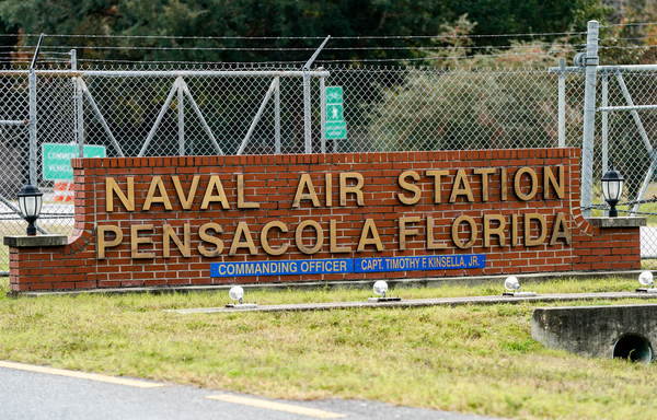A Saudi military student who carried out a deadly shooting spree at Pensacola Naval Air Station base on December 6th, 2019 had communicated with an al-Qaeda operative before the attack. [Josh Brasted/Getty Images North America/AFP]