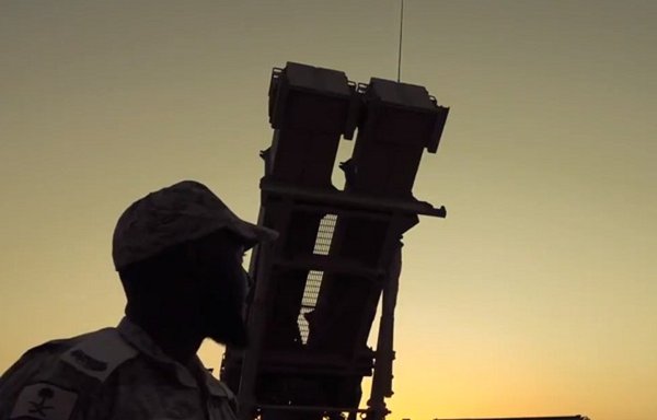 A member of the Saudi Royal Air Defence Forces stands next to a Patriot anti-missile battery that is used to shoot down Houthi missiles and UAVs. [Photo courtesy of Saudi Ministry of Defence]