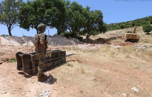 Lebanese soldiers close an illegal border crossing in Hermel in June as part of stepped up efforts to stop smuggling operations into Syria. [Photo courtesy of the Lebanese Army Command's Directorate of Guidance]