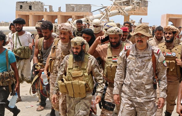 Fighters loyal to the separatist Southern Transitional Council are pictured in Yemen's Abyan province on June 24th. The Arab coalition said it had deployed observers to monitor the ceasefire between Yemeni forces and the southern separatists. [AFP]