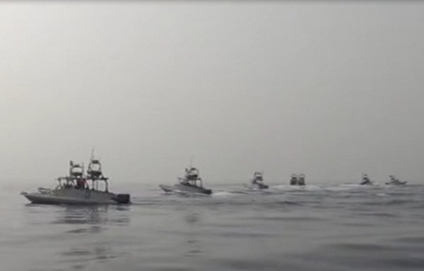 Iranian speedboats take part in a recently concluded military exercise conducted by the IRGC near the Strait of Hormuz. [Screenshot from Fars News video]