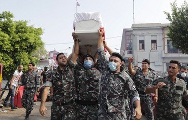 Beirut identifies victims, names judge to lead probe