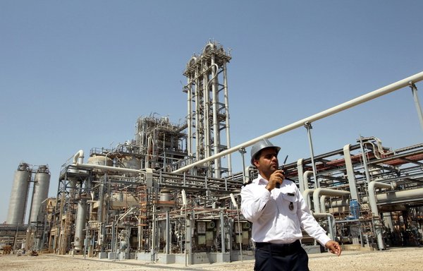 An Iranian security guard stands outside the Mahshahr Petrochemical Complex in the southwestern province of Khuzestan on September 28th, 2011. The city of Mahshahr is notable for its petrochemical industry. [AFP/STR]