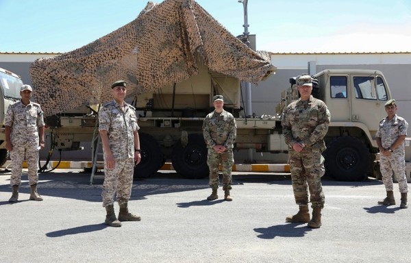 Col. Khaled al-Waishem (front left) from the Jordanian Armed Forces and Col. Andrew Caliendo (front right) from Task Force Spartan's 42nd Infantry Division during a recent joint military exercise that saw soldiers deploy a mobile command post from Kuwait to Jordan. [US CENTCOM]