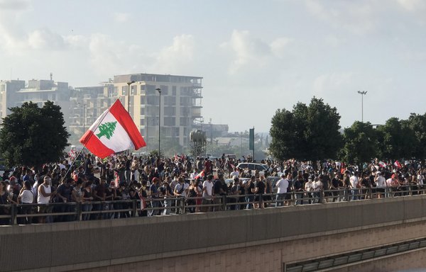 Lebanese took to the streets following the August 4th Beirut port explosion to denounce the ruling class and Hizbullah. New US sanctions have targeted two Lebanon-based companies linked to Hizbullah on September 17th for abusing Lebanese resources to benefit party officials. [Nohad Topalian/Al-Mashareq]