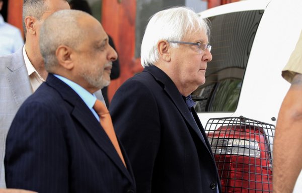 UN special envoy for Yemen Martin Griffiths (R) arrives at Sanaa international airport on July 16th, 2019. [Mohammed Huwais/AFP] 