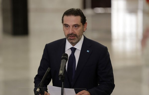 Former Lebanese prime minister Saad al-Hariri delivers a statement after the president named him to form a new cabinet, at the presidential palace in Baabda, east of the capital Beirut, on October 22nd. [Anwar Amro/AFP]