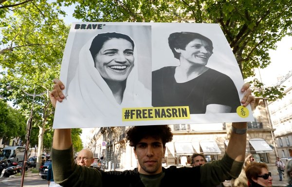 People gather outside Iran's embassy in France on June 13th, 2019 to support Iranian human rights lawyer Nasrin Sotoudeh and demand her release. [François Guillot/AFP]