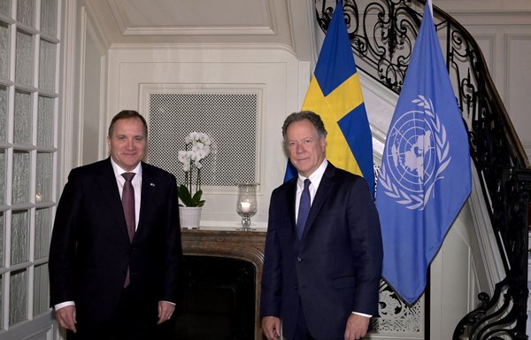 Swedish Prime Minister Stefan Lofven (L) stands with World Food Programme executive director David Beasley in Stockholm in October, after WFP's Nobel Prize win. [Janerik Henriksson/TT News Agency/AFP]