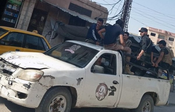 Members of the IRGC-affiliated Liwa al-Quds conduct a patrol in the streets of Deir Ezzor. [Photo via Euphrates Post]