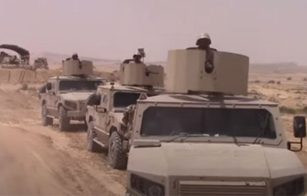 Egyptian military vehicles roll across North Sinai in pursuit of extremists. [Screenshot from video posted on Egypt's General Command of the Armed Forces Facebook page]