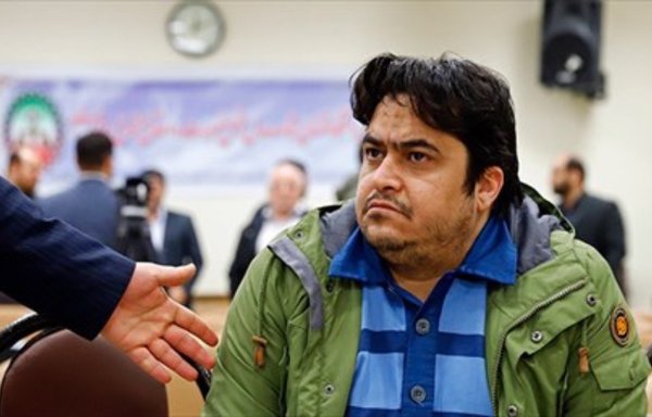 Rouhollah Zam, an Iranian regime dissident, is seen in a court session in February. Zam was hanged Saturday (December 12th), only four days after his final sentence. [Photo via YJC.ir]