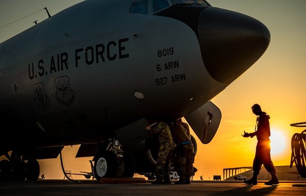 US Air Force personnel perform a walk-around during pre-flight checks at al-Udeid Air Base, Qatar, on December 16. [CENTCOM]