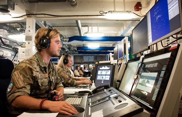 Military personnel inside the AGENOR operations room co-ordinate operations and receive emergency reports. [French Ministry of the Armed Forces]