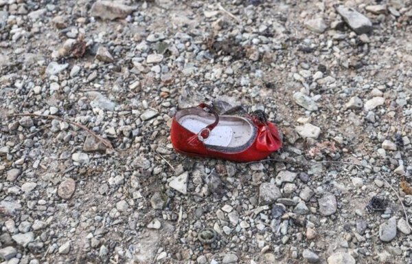Shoe belonging to the airliner's youngest victim, 1, an Iranian-Canadian killed with her parents. [Photo via Hamshahrionline.ir]