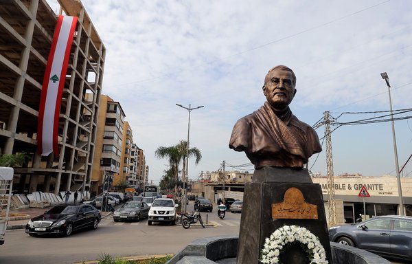 A photo taken January 5 shows the newly unveiled statue of late IRGC Quds Force commander Qassem Soleimani in the southern Beirut suburb of al-Ghobeiry. [Joseph Eid/AFP]