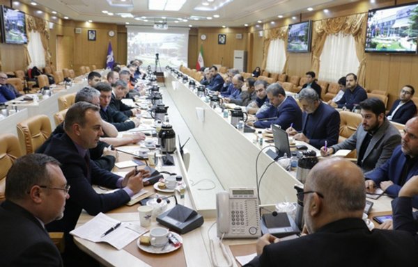 This handout picture provided by the Iranian Civil Aviation Organisation on January 9, 2020, shows Iranian and Ukrainian aviation experts meeting in Tehran to investigate the circumstances of the crash of Ukrainian Boeing 737. [HO/Iran Civil Aviation Organisation/AFP]