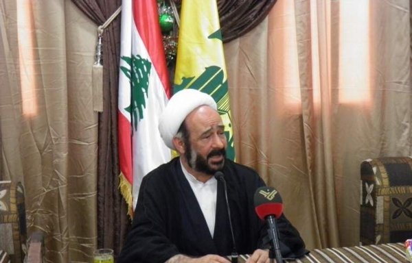 Hizbullah operative Muhammad Kawtharani delivers a lecture on the situation in Syria in the southern Lebanon city of Bint Jbeil on September 14, 2014. [bintjbeil.org]