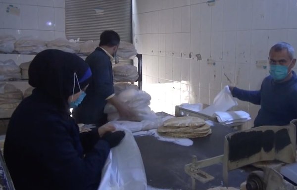 Bakeries like this one have seen long lines amid Syria's bread crisis. A reduction of wheat imports from Russia has exacerbated the situation. [SANA]