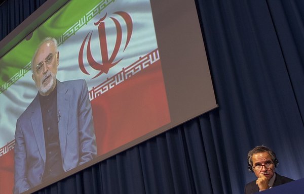 International Atomic Energy Agency director general Rafael Grossi listens to Iran's atomic energy chief Ali-Akbar Salehi, attending virtually, at the 64th General Conference of the IAEA in Vienna, Austria, on September 21. [Joe Klamar/AFP]