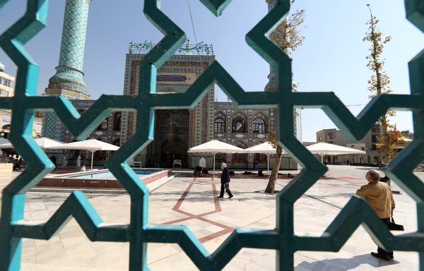 Iranians visit the Imamzadeh Saleh mosque in Tehran's Tajrish square on November 1. [Atta Kenare/AFP]