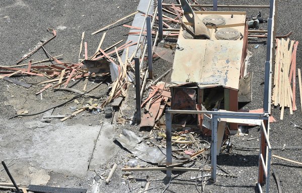 A picture taken June 13, 2019 shows damage on the roof of Abha airport, one day after a Houthi missile attack on the airport wounded 26 civilians. [Fayez Nureldine/AFP]