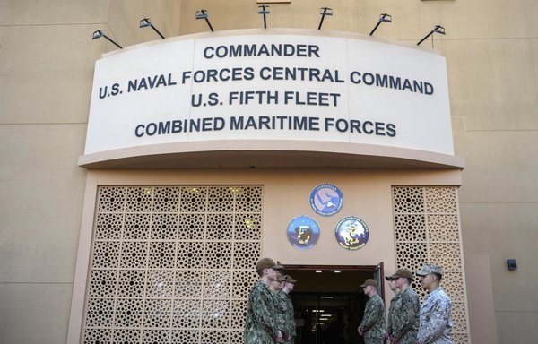 US Navy personnel stand at the entrance to US 5th Fleet, Combined Maritime Forces headquarters in the Bahrain capital Manama on January 11, 2019. [Andrew Caballero-Reynolds/POOL/AFP]