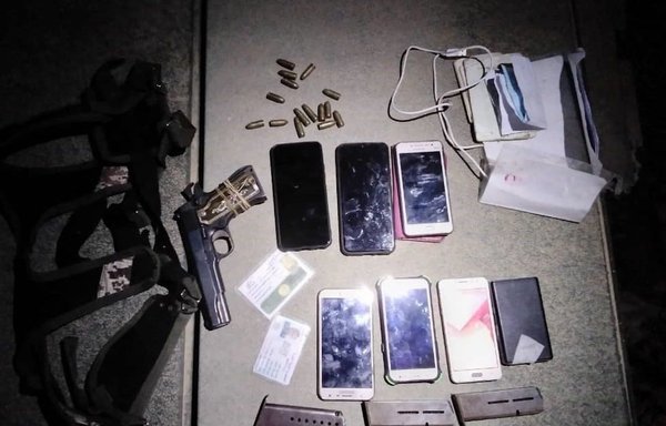 Weapons, ID cards and communication devices found in the possession of ISIS elements in rural Deir Ezzor. [SDF]