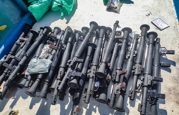 The US Navy seized two illicit shipments of weapons and weapons components from two stateless dhows during a maritime security operation in international waters off the coast of Somalia February 11 and 12. [US Navy]