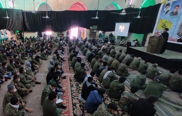 Elements of the Iran-backed Fatemiyoun Division, a militia fighting in Syria, attend an event January 3, the first anniversary of the death of IRGC Quds Force commander Qassem Soleimani. [Fatemiyoun/Telegram]
