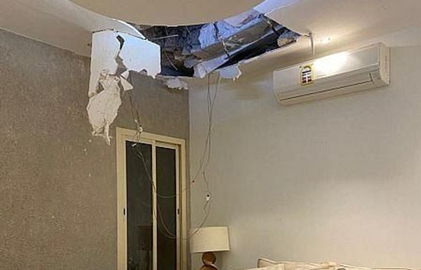 A civilian home in Riyadh shows damage resulting from shrapnel from a missile fired by the Houthis on February 27. [Saudi Press Agency]