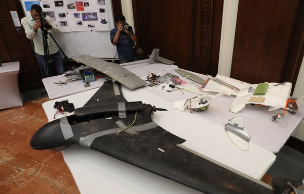 A picture taken on June 19, 2018 in Abu Dhabi shows a drone Emirati armed forces say was used by the Houthis in Yemen in battles against Arab coalition forces. [Karim Sahib/AFP]