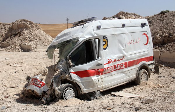A destroyed ambulance from the Syrian Civil Defence (White Helmets) is seen in the town of Khan Sheikhun, Idlib province, on September 22, 2017, following reported Russian airstrikes. [Omar Haj Kadour/AFP]