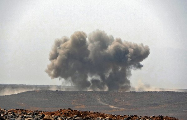 Smoke billows during clashes between forces loyal to Yemen's Saudi-backed government and the Iran-backed Houthis in Yemen's northeastern province of Marib on March 5. [AFP]