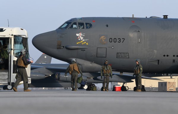 US pilots board a B-52 bomber in preparation for a flight on March 6 at Minot Air Force Base, North Dakota. [CENTCOM]