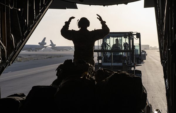 A US C-130 is loaded with cargo at Ali al-Salem Air Base, Kuwait, on March 3. [CENTCOM]