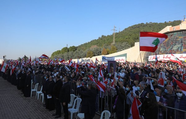 Lebanese protesters gather in support of Maronite Patriarch Beshara Boutros al-Rahi on February 27 at the Maronite Patriarchate in the mountain village of Bkerke, northeast of Beirut. [Anwar Amro/AFP]