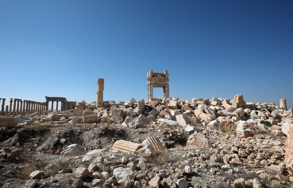 A picture taken February 7 shows the damaged Temple of Bel in the ancient city of Palmyra in Syria's Homs province. Syria has six sites listed on the UNESCO elite list of world heritage, and all of them sustained some level of damage in the 10-year war. [Louai Beshara/AFP]