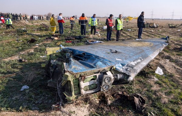 Rescue teams on January 8, 2020, on the scene of the Ukrainian airliner crash near Imam Khomeini airport in Tehran. The IRGC mistakenly downed the plane. [Akbar Tavakoli/IRNA/AFP]