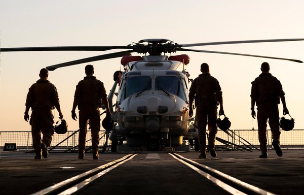 Dutch members of the European Maritime Awareness in the Strait of Hormuz (EMASOH) about to board a helicopter. [Dutch Ministry of Defense]
