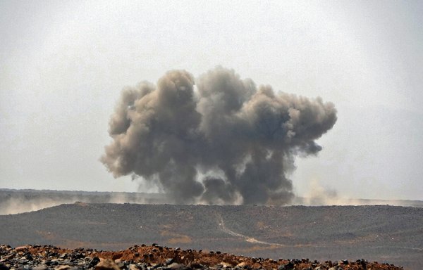 Smoke billows during clashes between pro-government forces and the Iran-backed Houthis (Ansarallah) in Yemen's Marib province on March 5. [AFP]