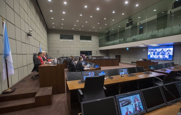 Judges are seen before the start of the December 11 session of the Lebanon Tribunal in Leidschendam, where the sentence was set for Salim Jamil Ayyash, a Hizbullah operative convicted of involvement in the 2005 assassination of former Lebanese Prime Minister Rafiq al-Hariri and 21 others. [Peter Dejong/ANP/AFP]
