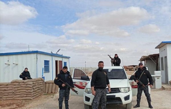 Members of a private security company in Syria that is actively promoted on social media pose for a photograph. [Shurouk for Security Services Facebook page]
